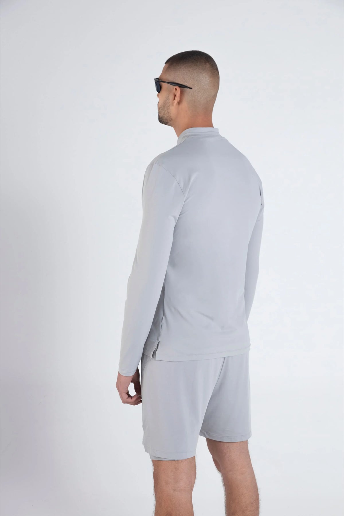 Camiseta gris deportiva manga larga cuello con cierre slim fit Dew