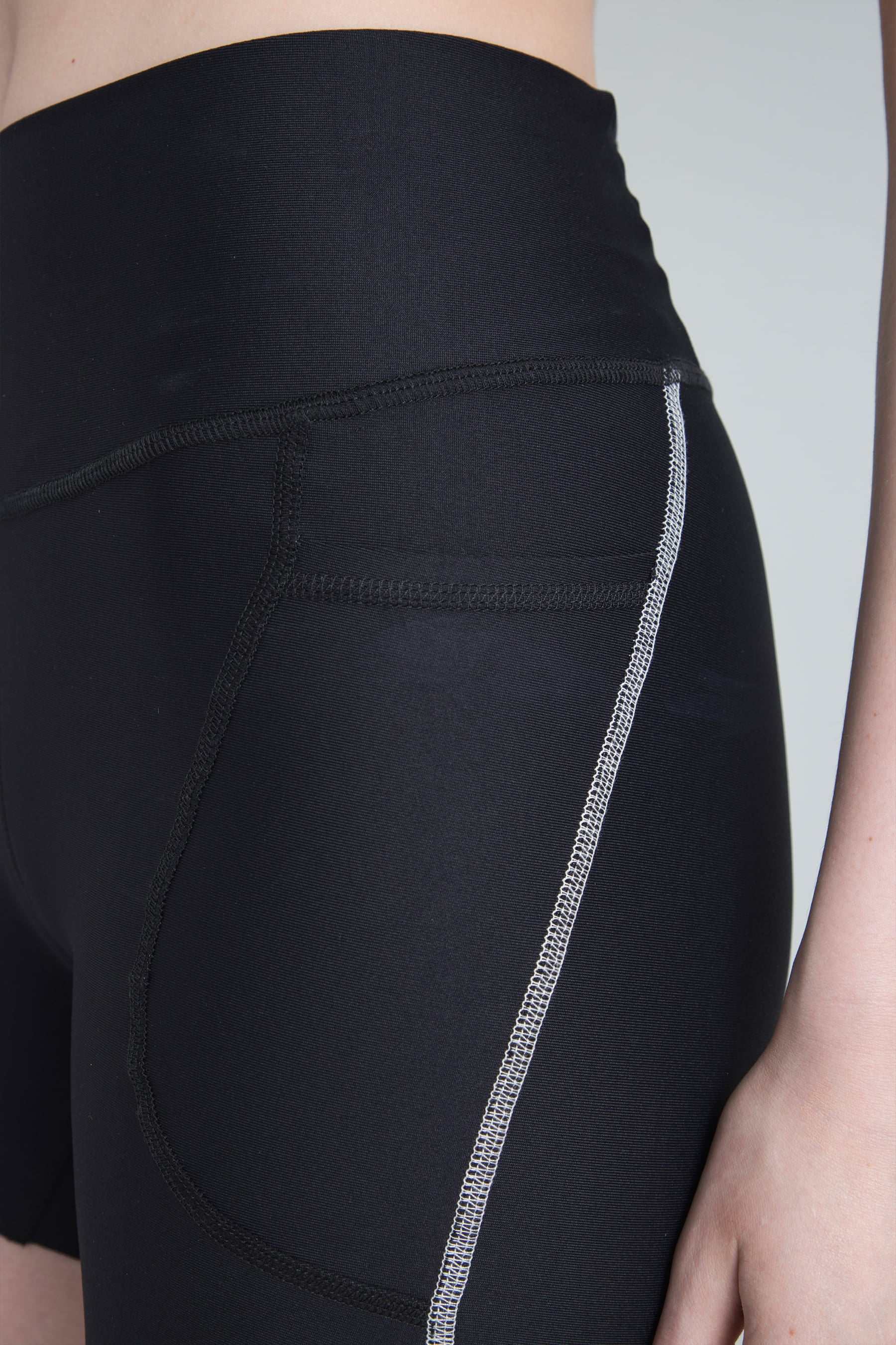 Detail of lines in contrast on Women's black biker