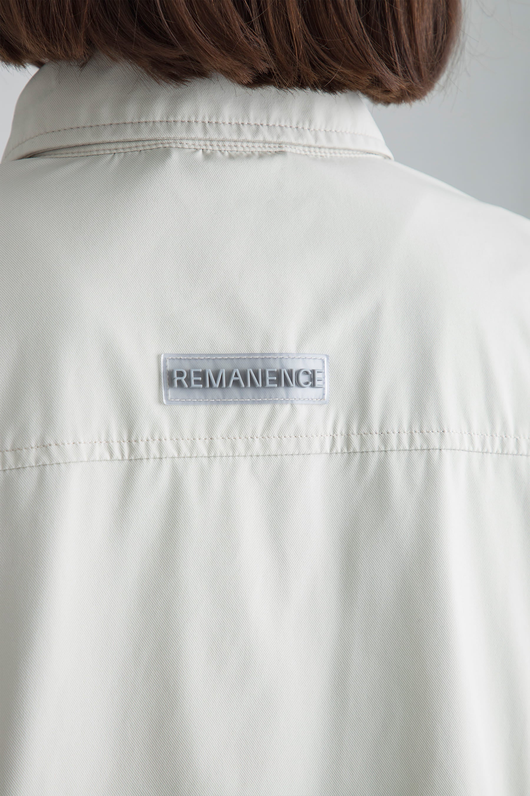 Back logo detail in Women's sand jacket