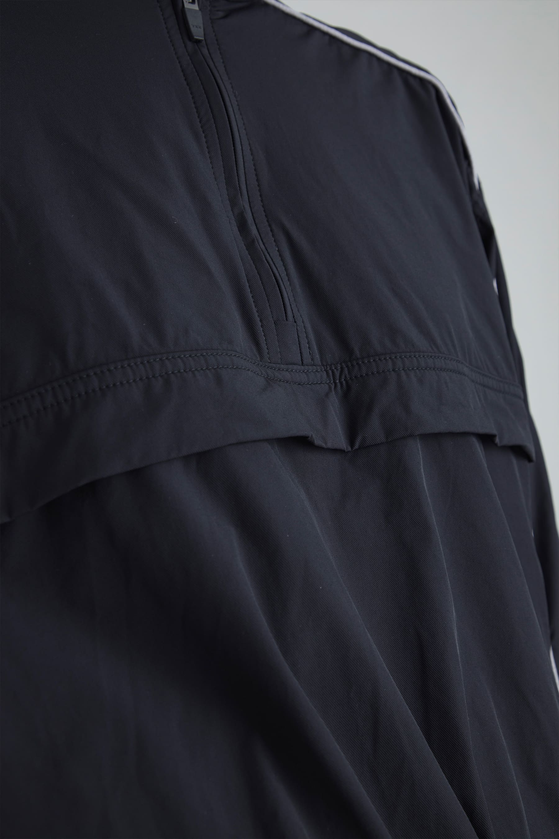 Women's black half zip jacket shade – Remanence International