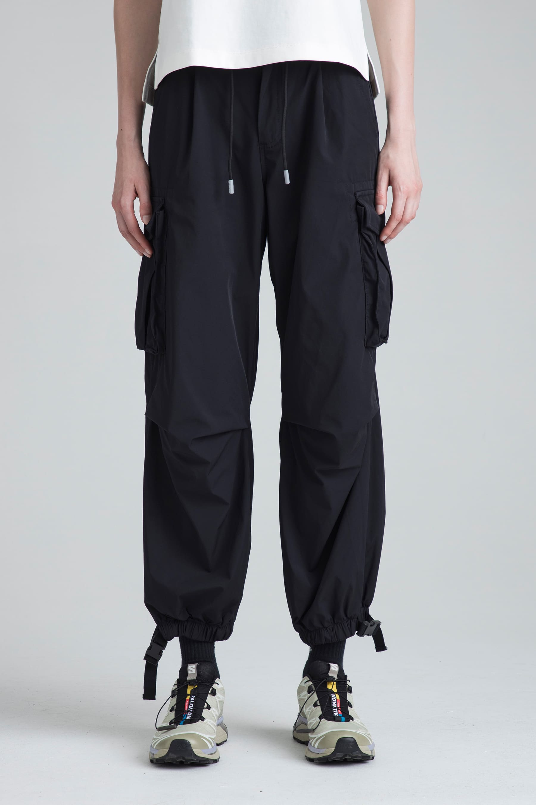 Women's black parachute pants Noir front view on model