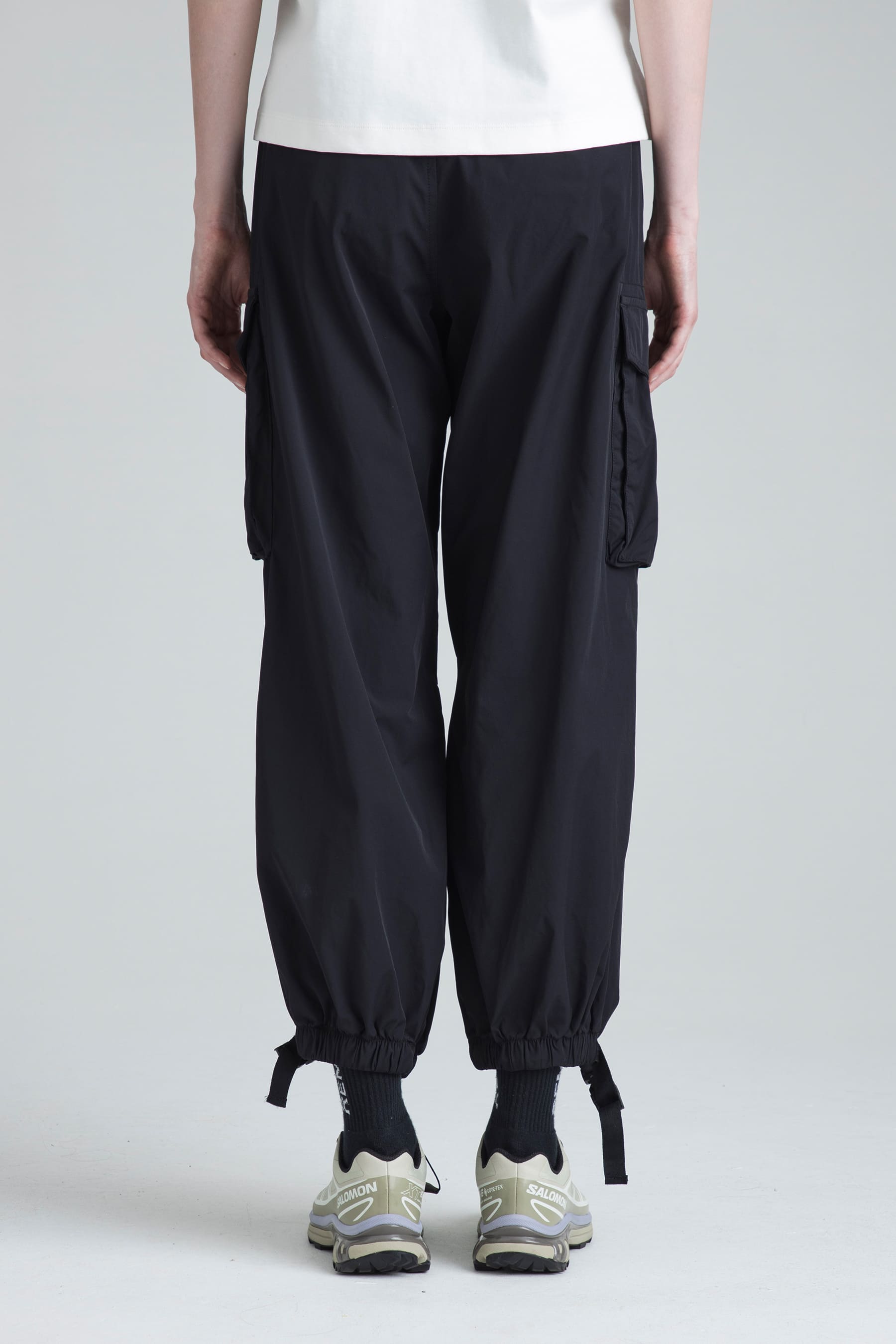 Women's black parachute pants Noir back view on model