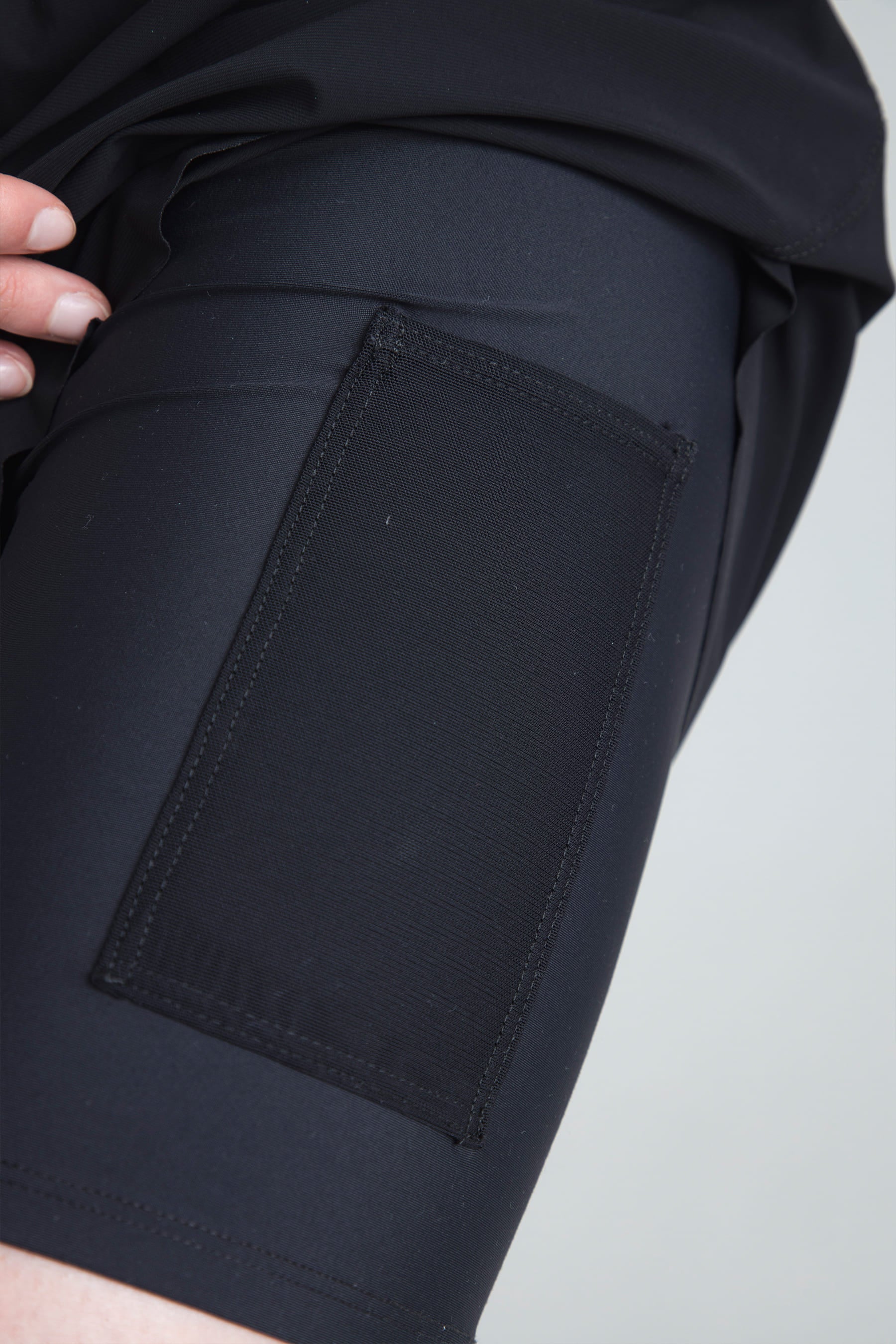 Detail of pocket in biker in Women's black sports shorts