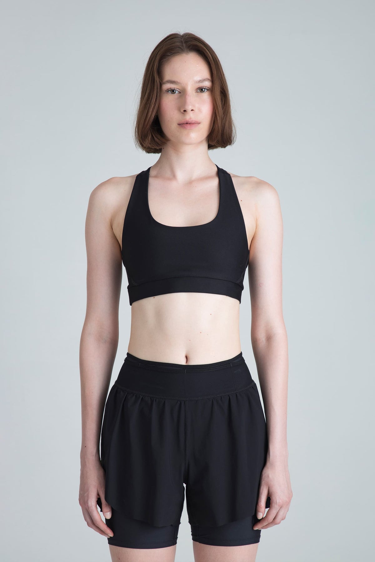 Women’s black medium-support sports top Motion